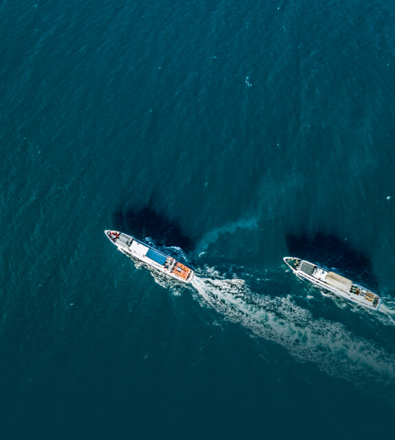 Top view of two cruise ships in the open sea